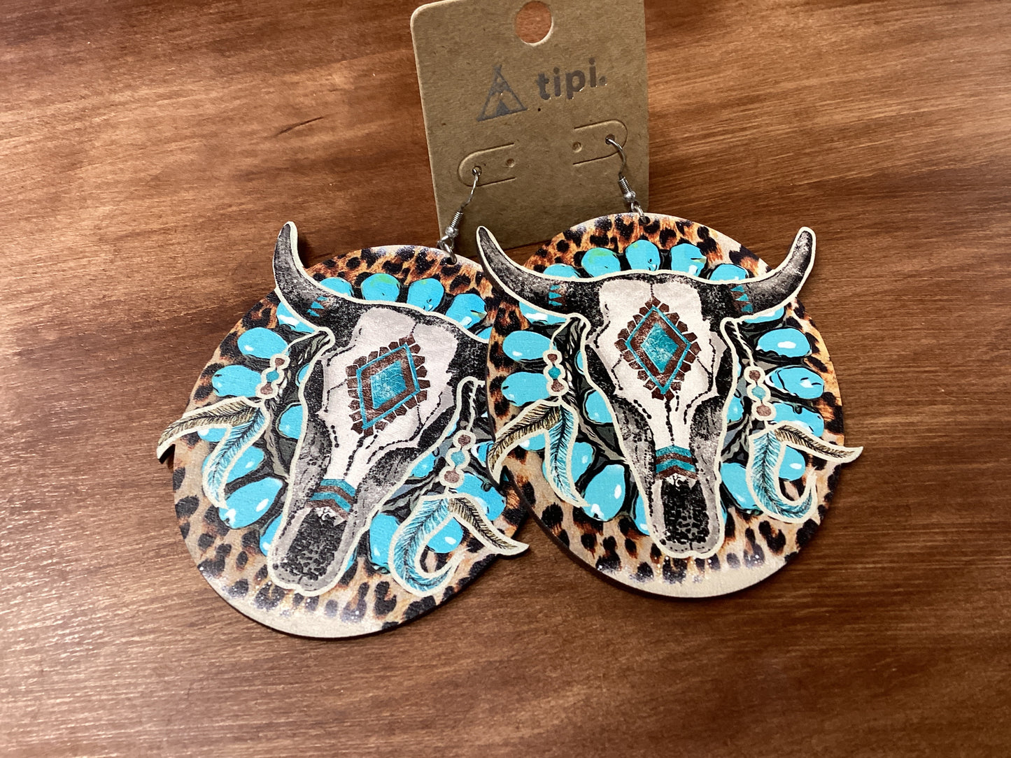 Tipi cow head earrings