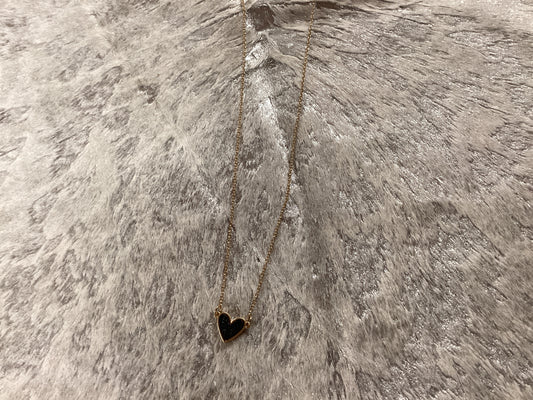 Black heart on gold chain