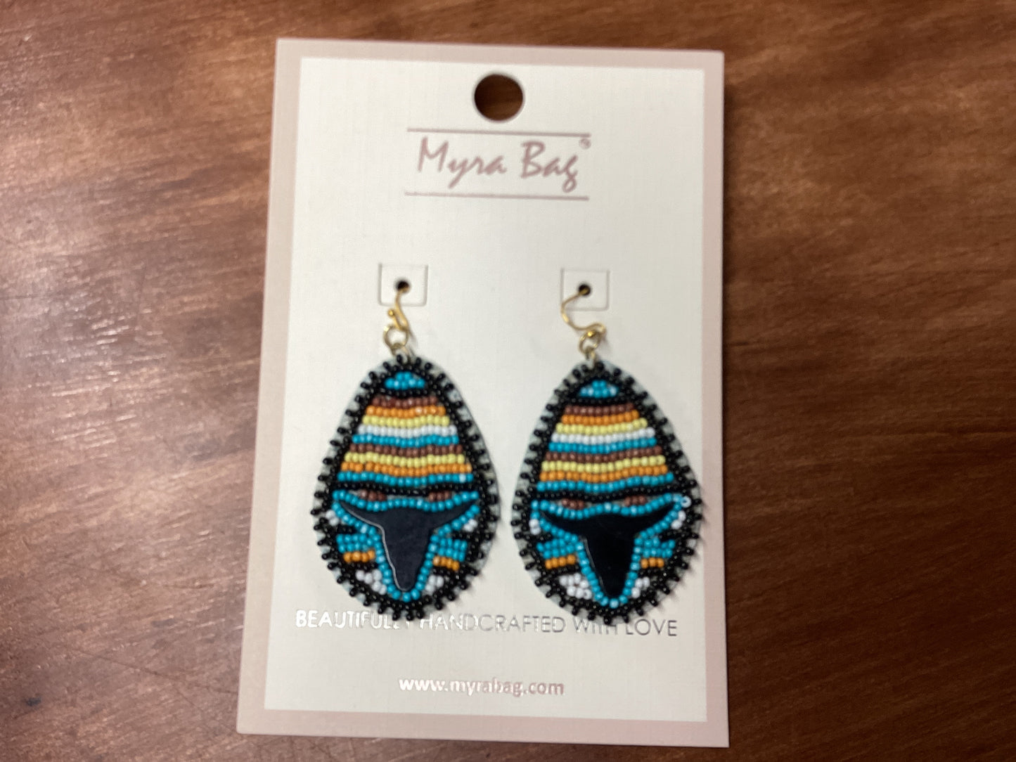 Oval seed bead earrings w/black cow head