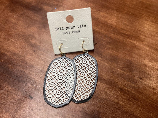 White earrings with black trim