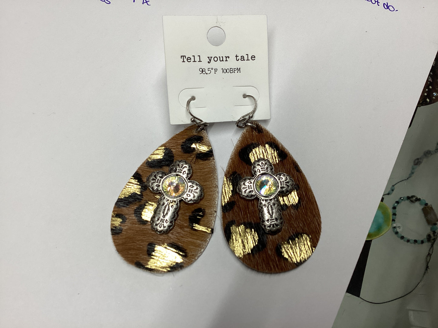 Brown animal print with cross