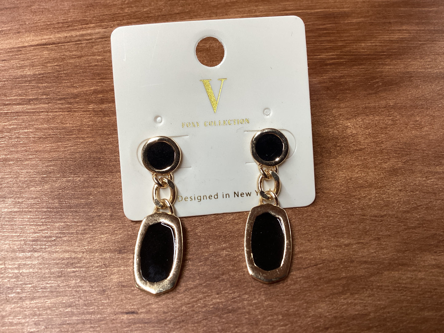 V-gold trim with black dangle earrings