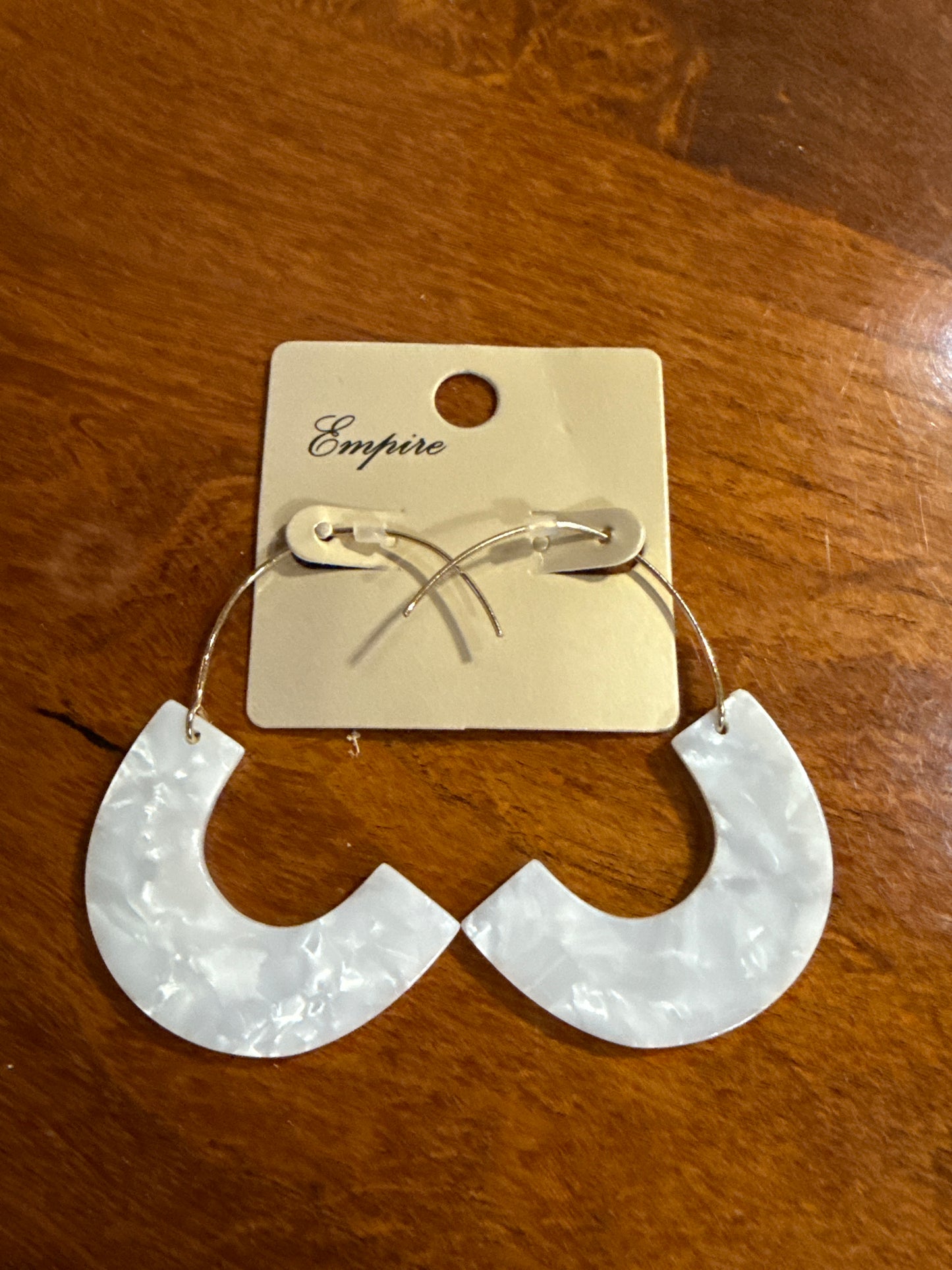 Gold and acrylic earrings