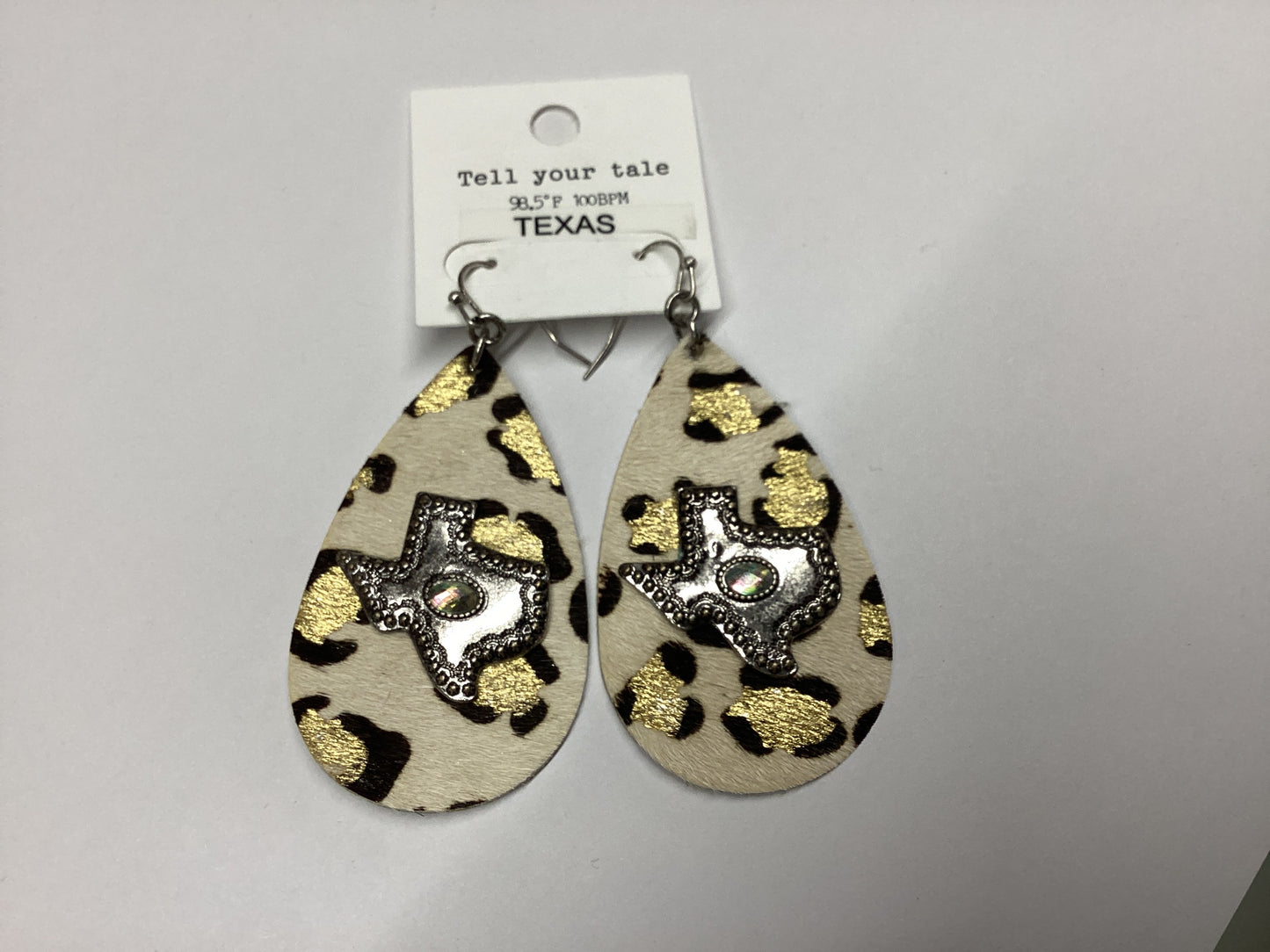 Cream color animal print with State of Texas