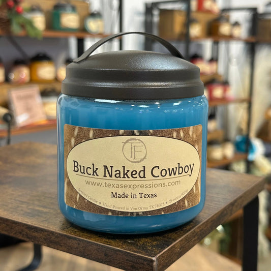 Buck Naked Cowboy Texas Expressions Candle 16 Oz