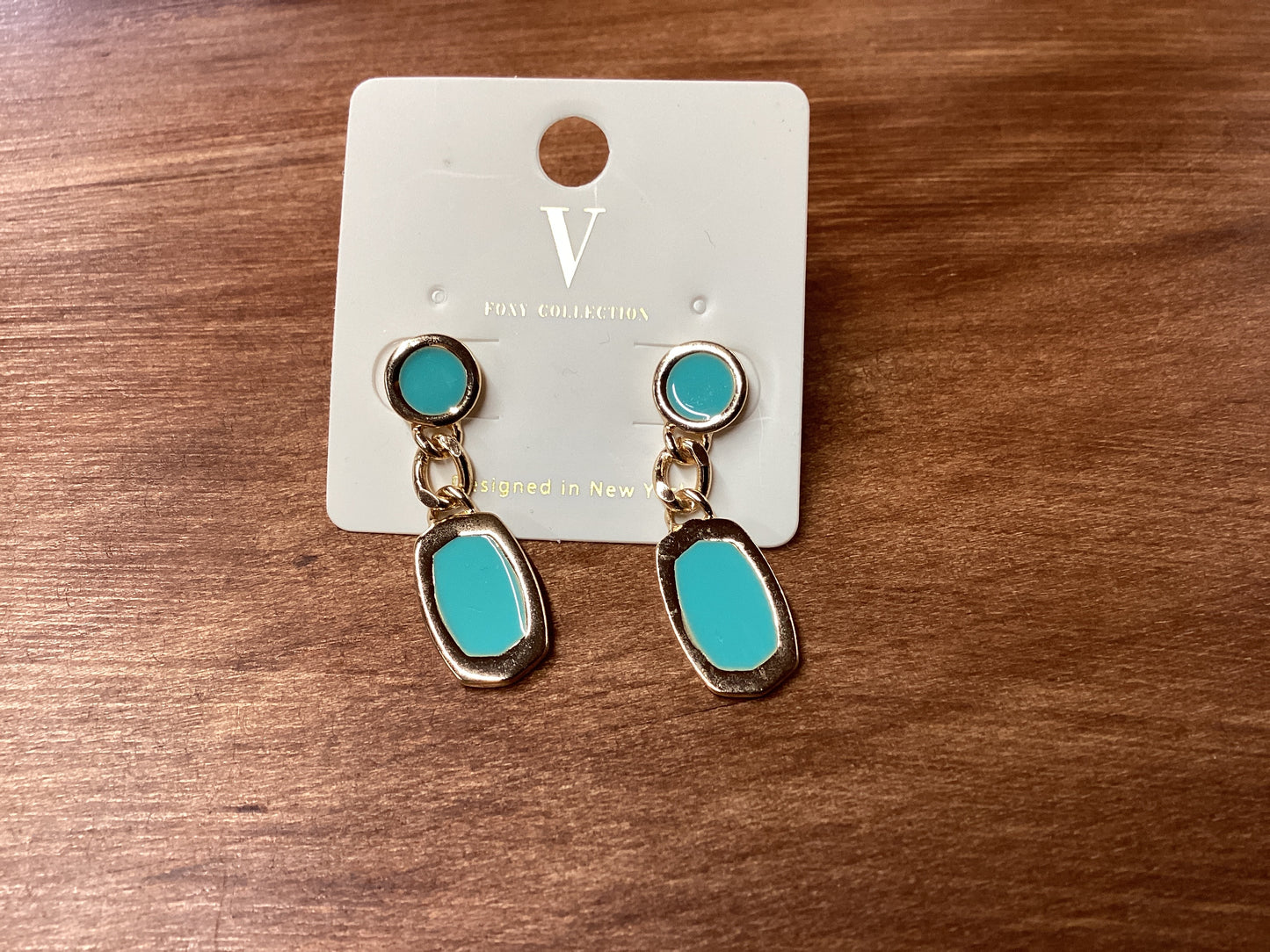 V-gold trim with turquoise dangle earring