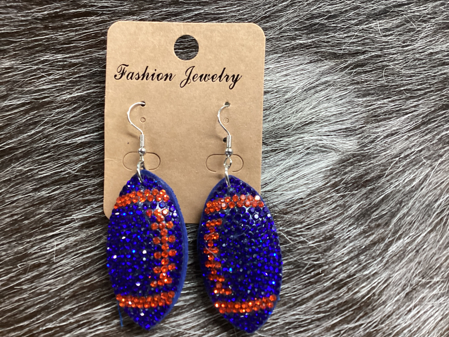 Blue, orange rhinestone football earrings