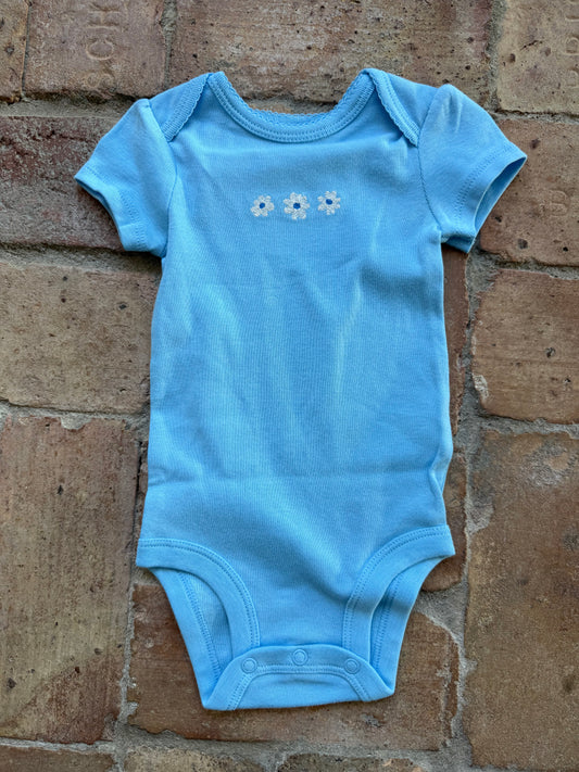 Blue Carters onesie with flowers