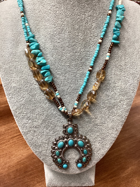 Turquoise with brown Crystal beads w/horeshoe