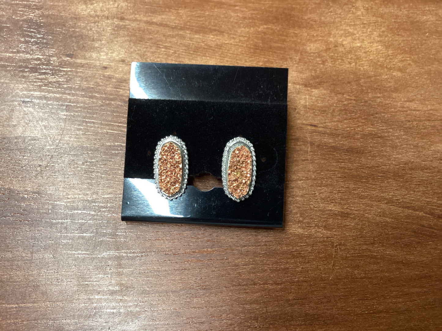 Oval rose gold with silver trim