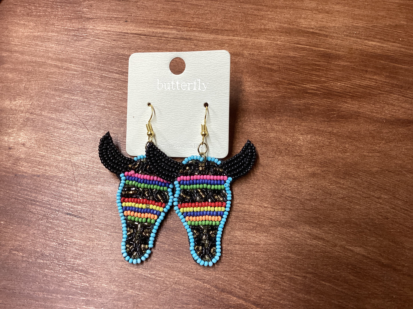 Black w/multi color seed beads cow head earrings