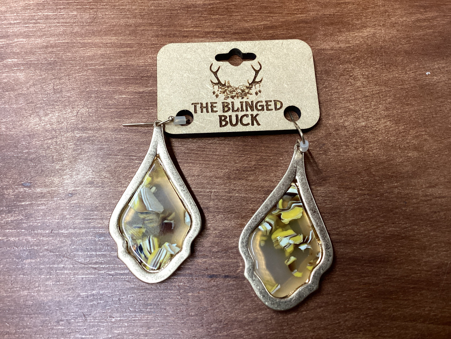 Gold trim with yellow, white enamel inset dangle earrings