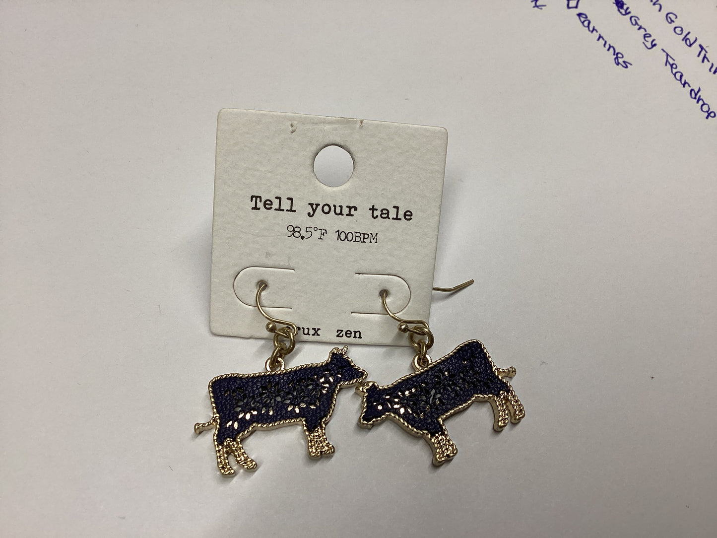 Black cow earrings