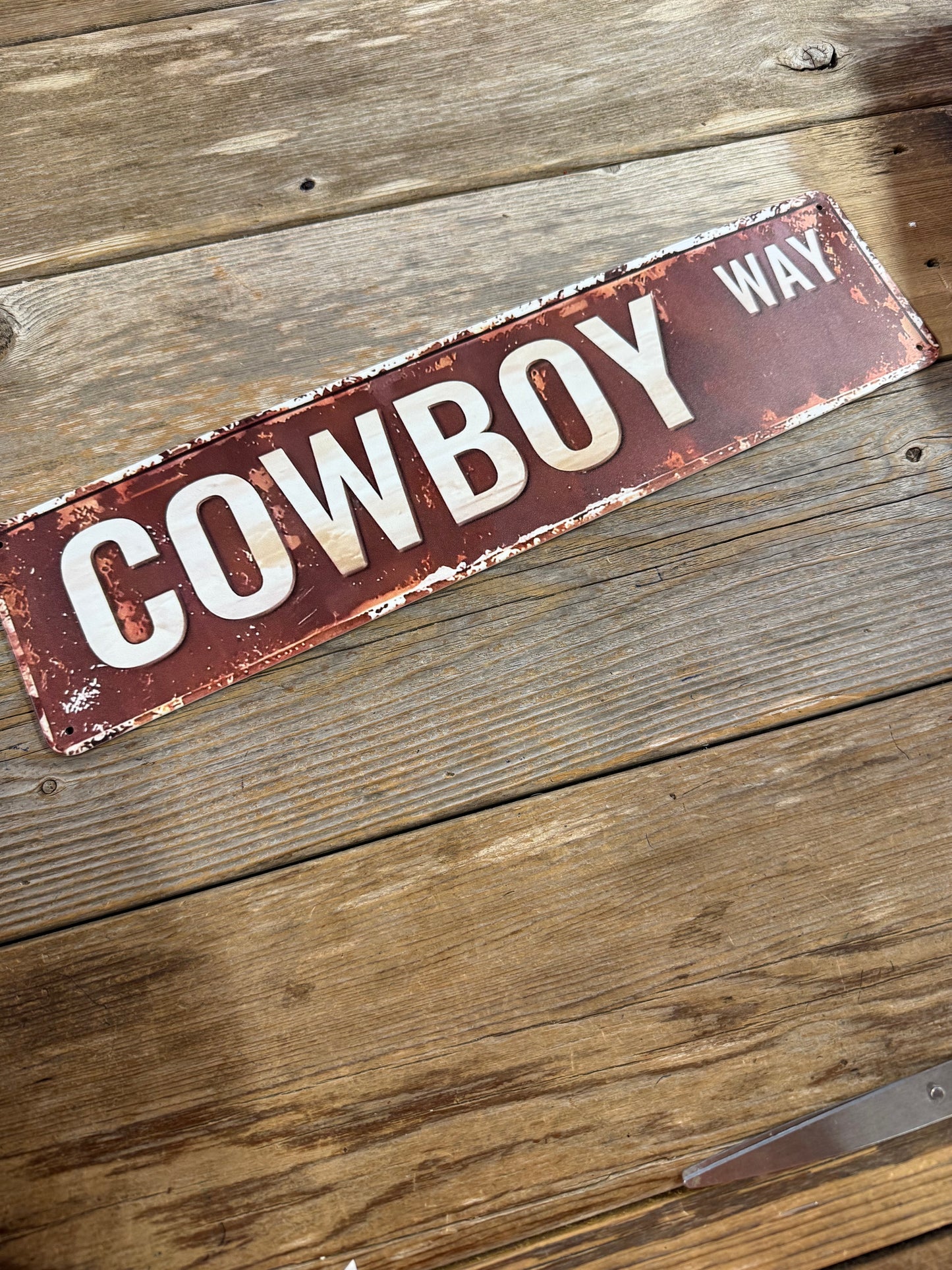 Cowboy way metal sign