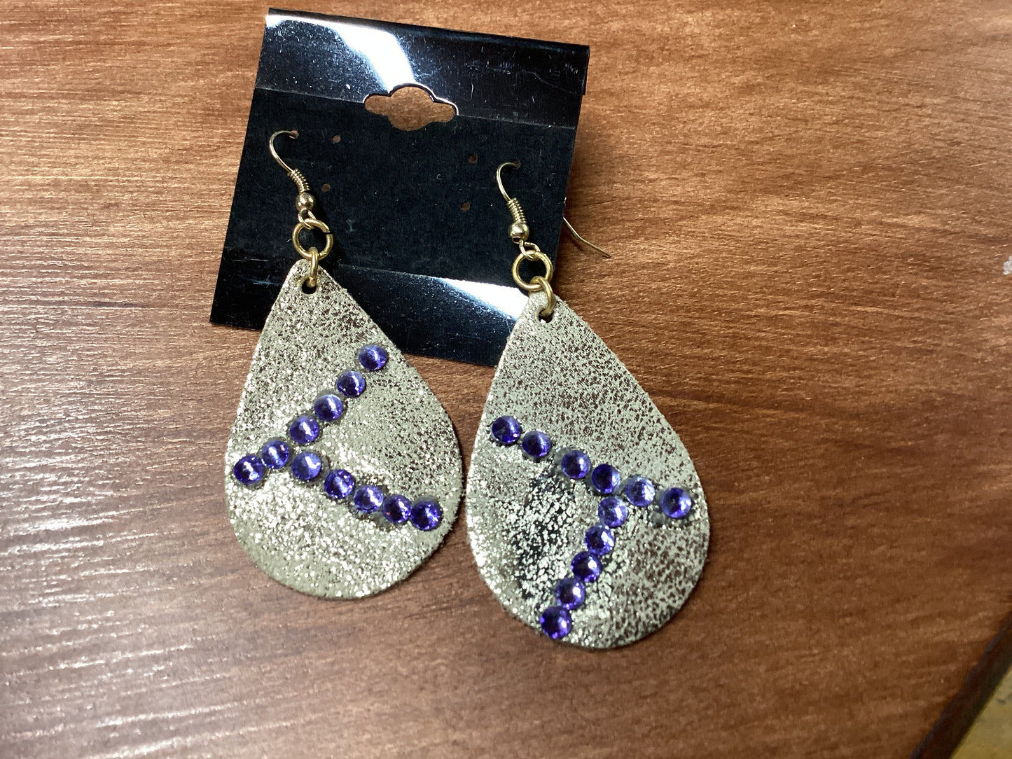 Faux leather earrings with blue stones