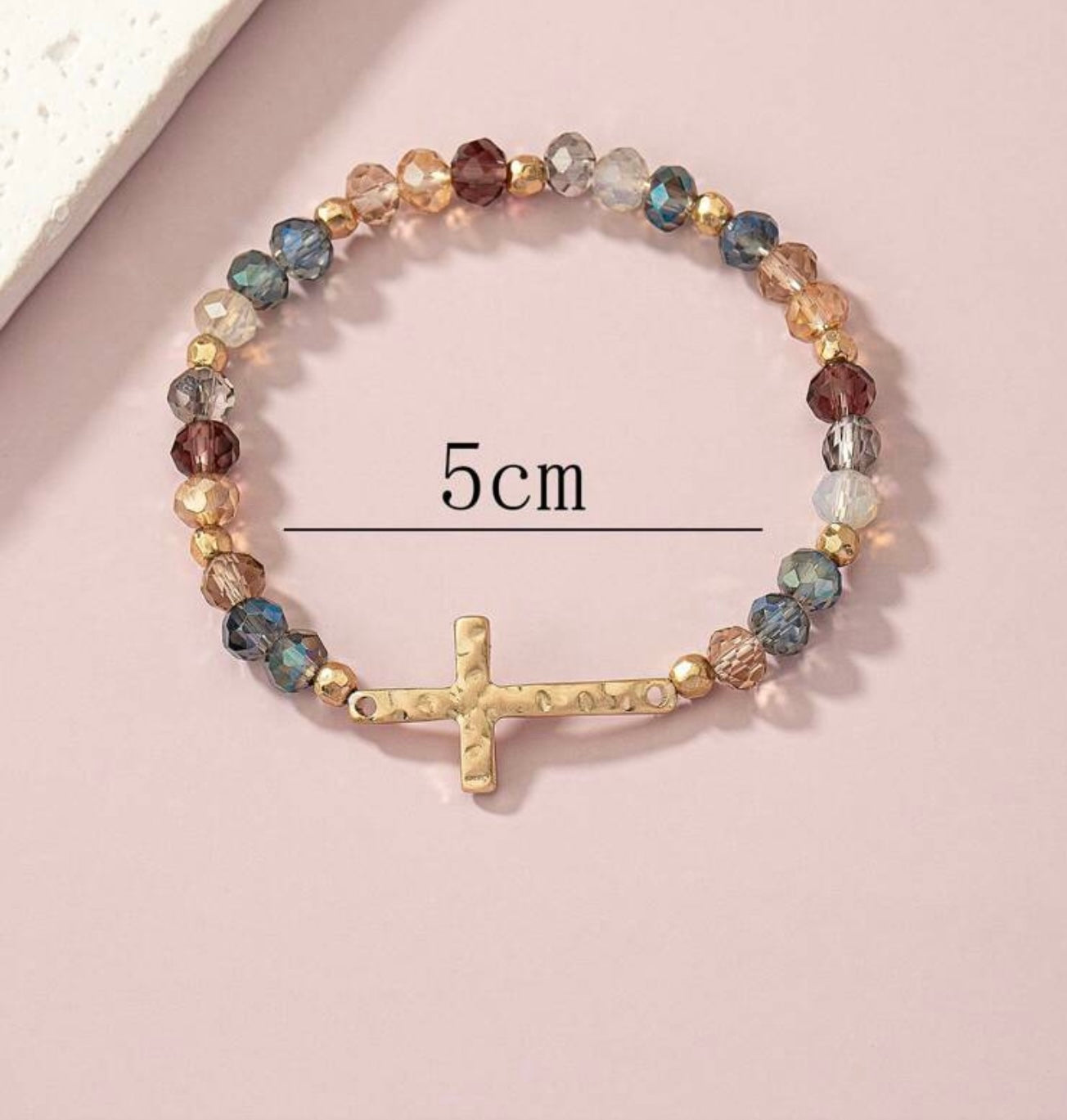 Beaded Gold tone cross bracelet