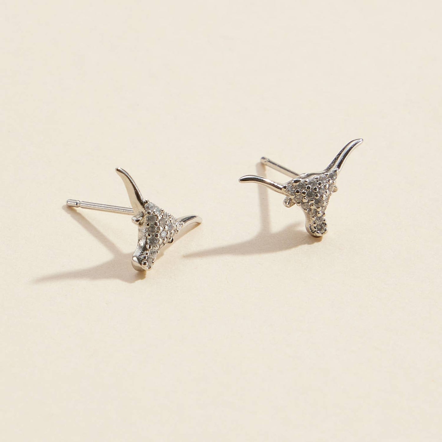 Bull Head CZ Gold Dip Stud Earrings: White Gold Frem