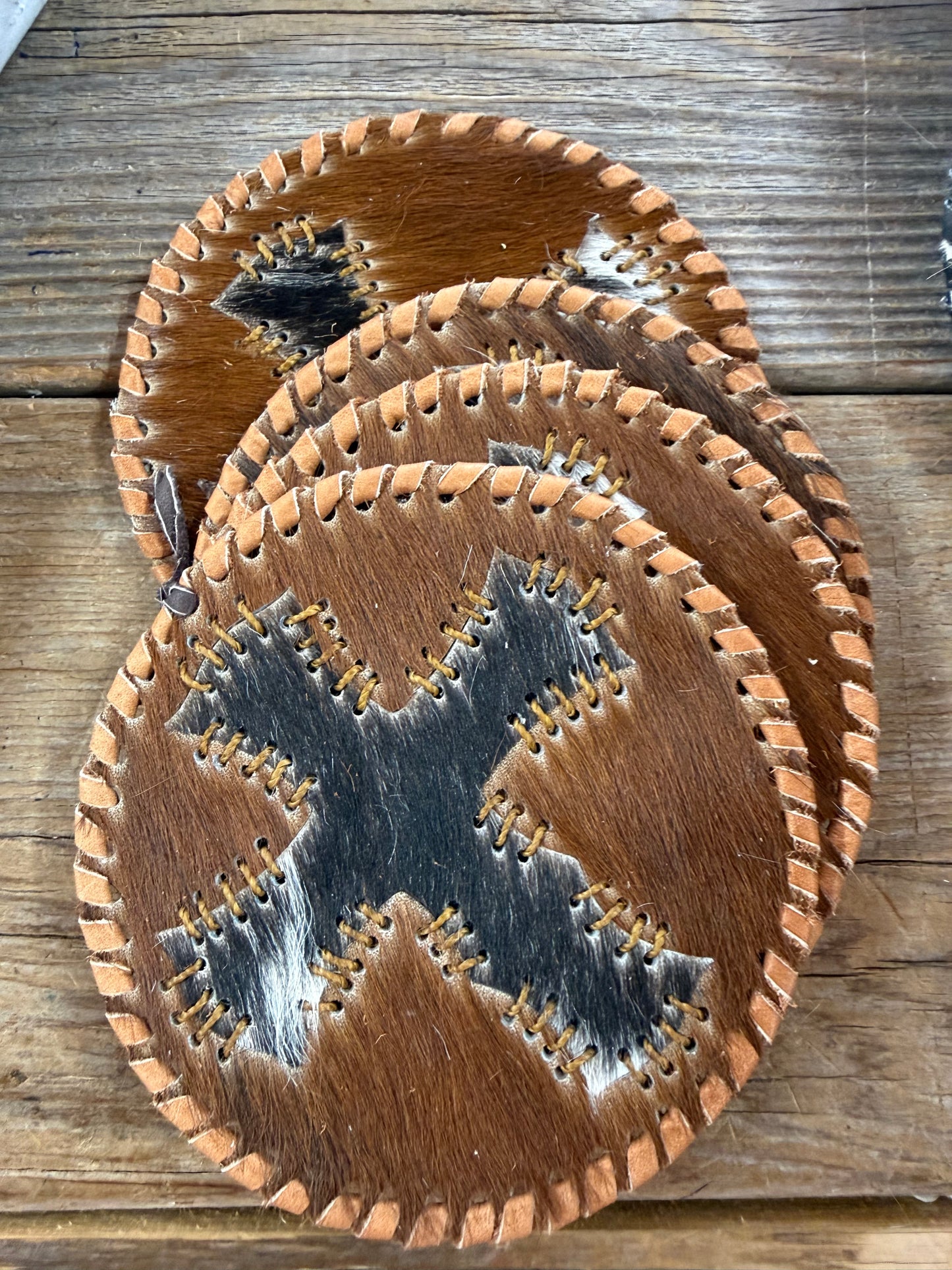 Cowhide Round Coasters  Set Of Four Hides and Skins