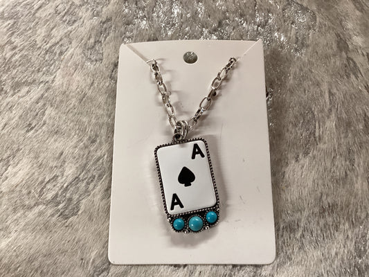 Ace card with turquoise silver necklace
