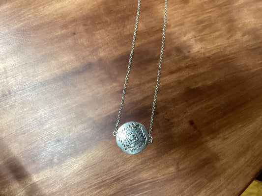 Silver pendant on silver chain