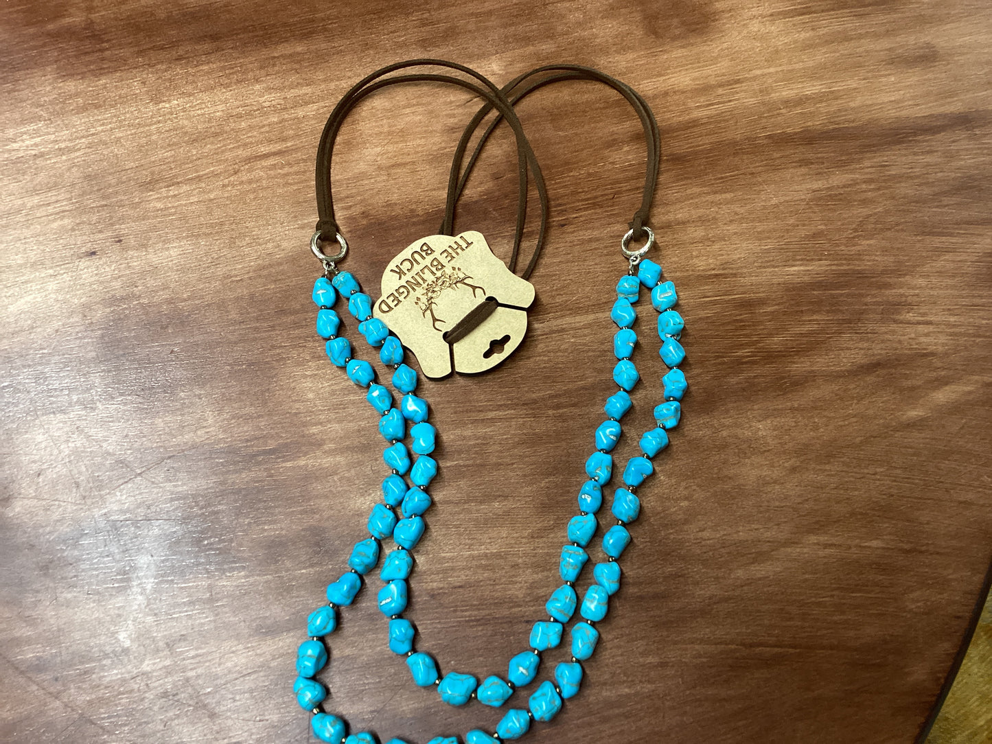 Turquoise beaded necklace on cord