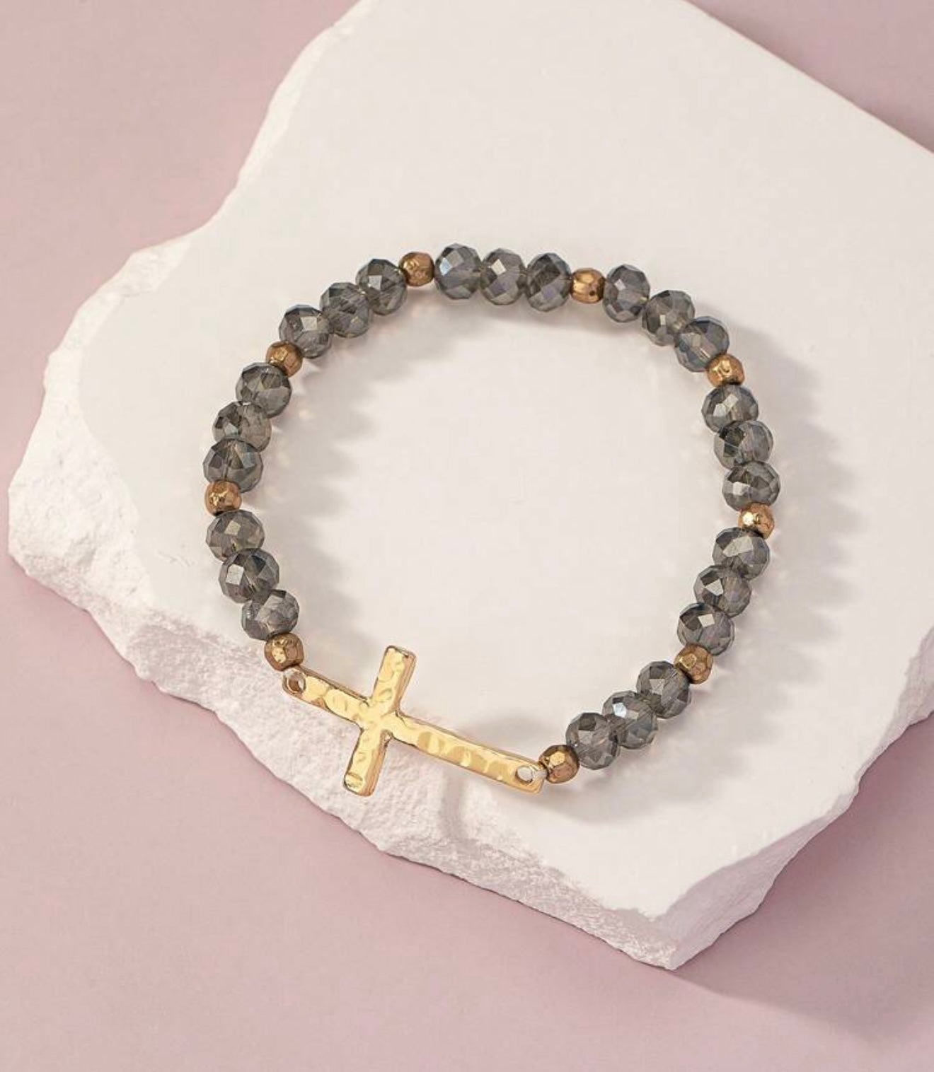 Beaded Gold tone cross bracelet