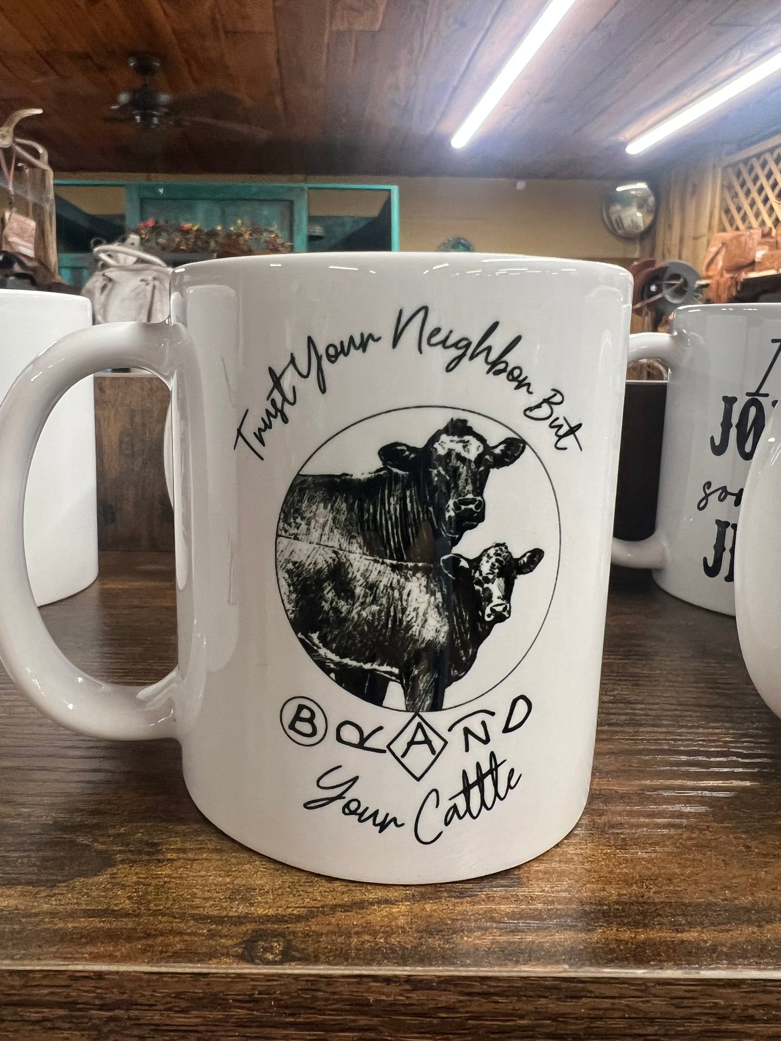 Trust your neighbor but Brand your cattle Coffee Mug