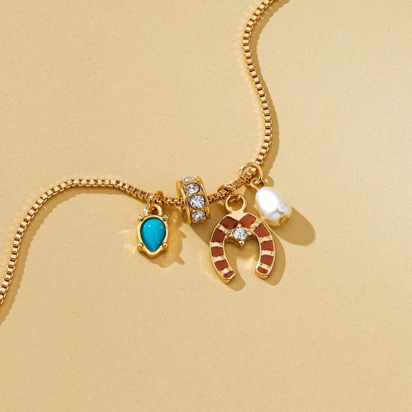 Southwest Horseshoe & Turquoise Charm Necklace | 80N93130: Gold