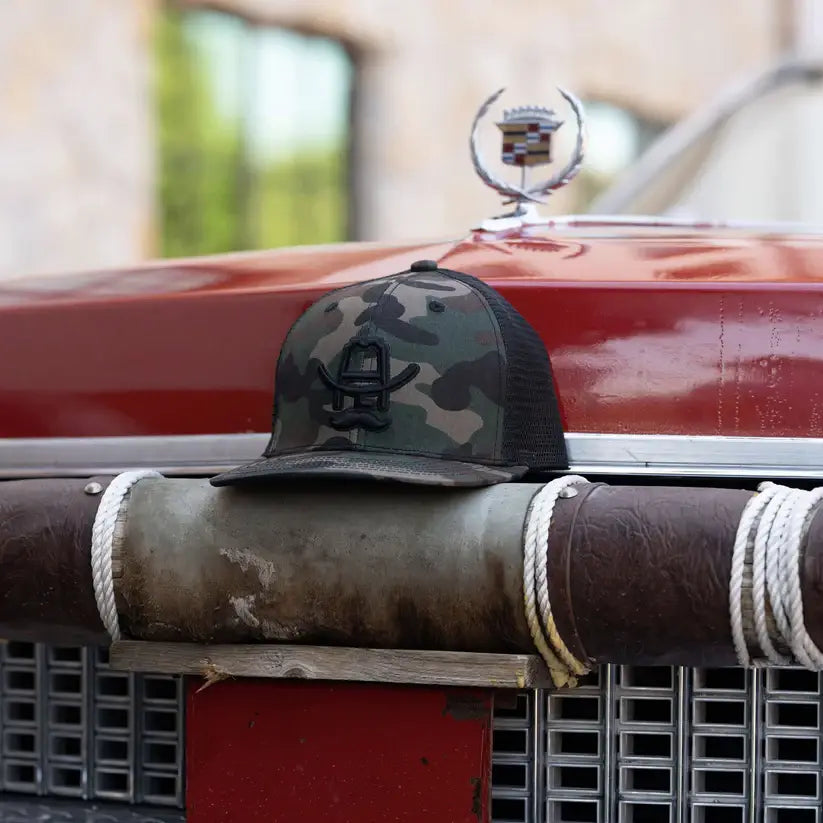 Hank 3D Flat Bill Trucker Hat: Green Camo/Black